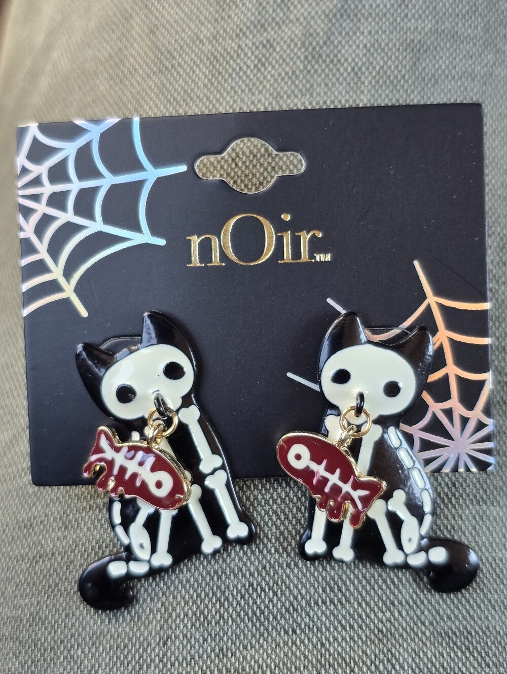 nOir Jewelry Black & White Skeleton Cat Earrings with Red Fishbone Dangles NWT's